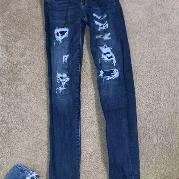 dark washed ripped jeans, covered rips - Picture 1 of 1